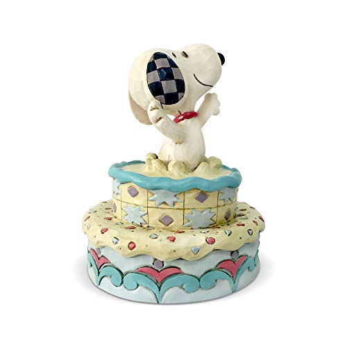 Enesco 6005944 Peanuts by Jim Shore Snoopy Jumping Out of Birthday Cake Figurine, 5.5 Inch, Multicolor